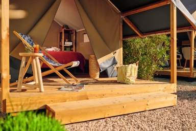 Exterior view of the Mini Wood tent: unusual accommodation available to rent at Le Paquier Fané campsite in Chagny, Bourgogne-Franche-Comté